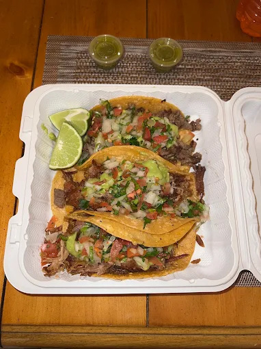 #15 Bean Tostada, Beef Taco & 2 Rolled Tacos